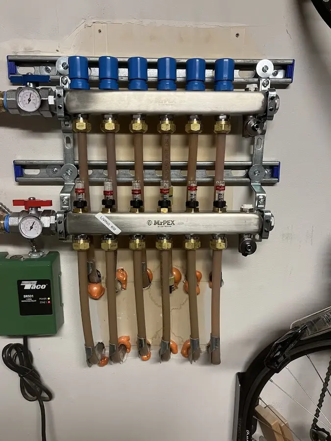 Plumber performing Gas Line Installation at a residential property in Brookhaven